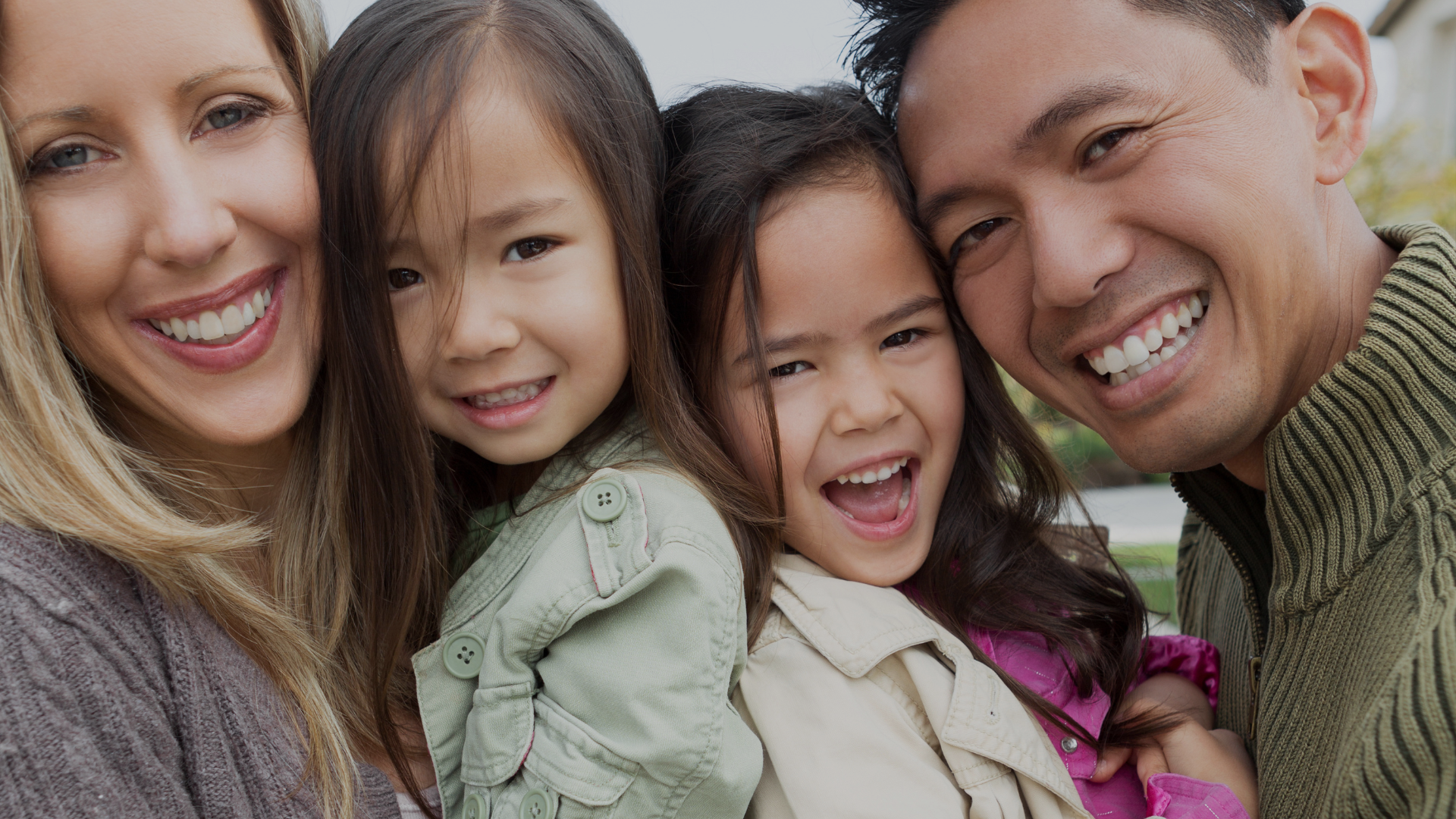 A family, full of smiles with healthy teeth.